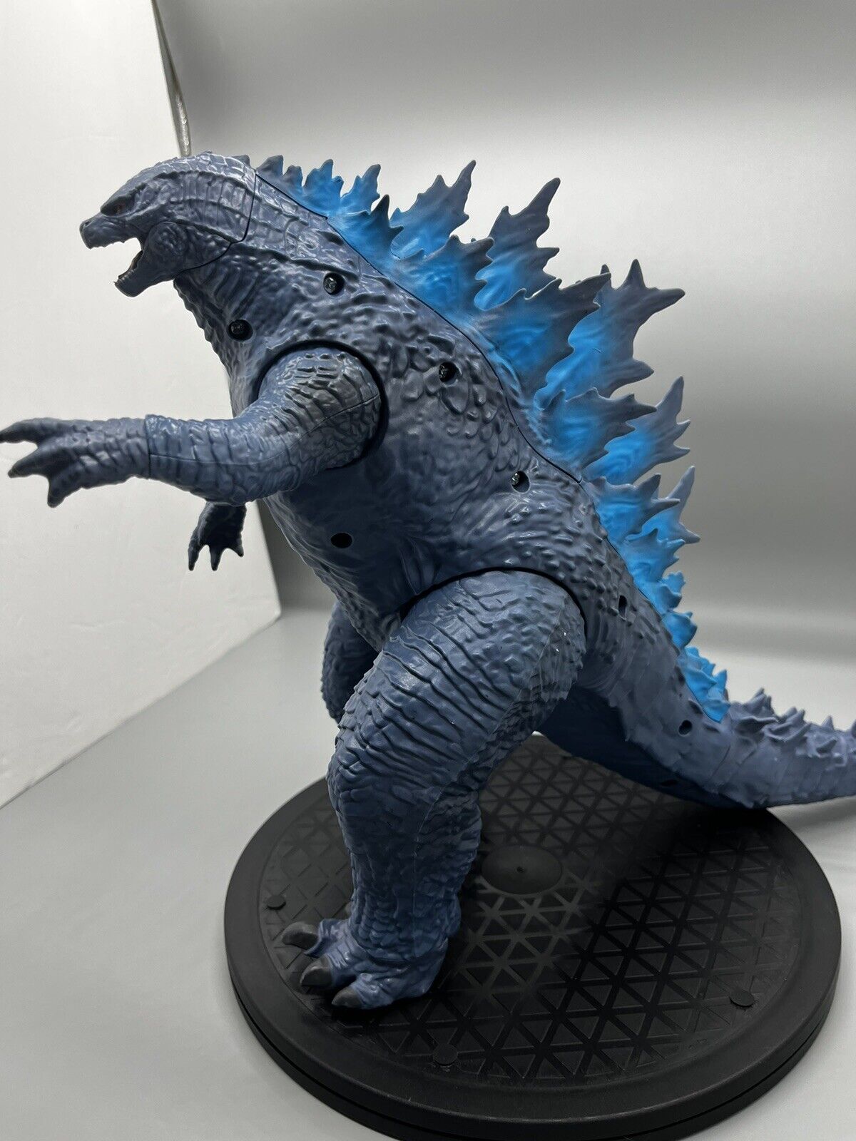 Godzilla figure, movable body parts, and blue flame back 22" x 12"