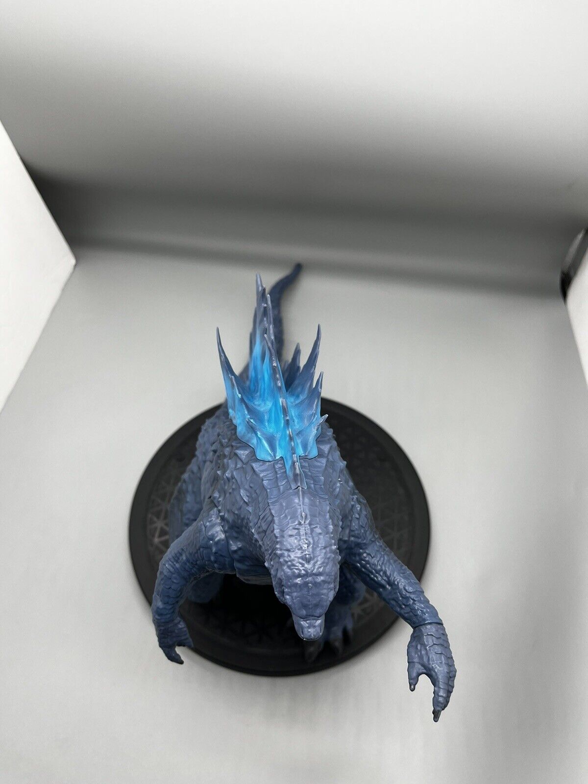 Godzilla figure, movable body parts, and blue flame back 22" x 12"