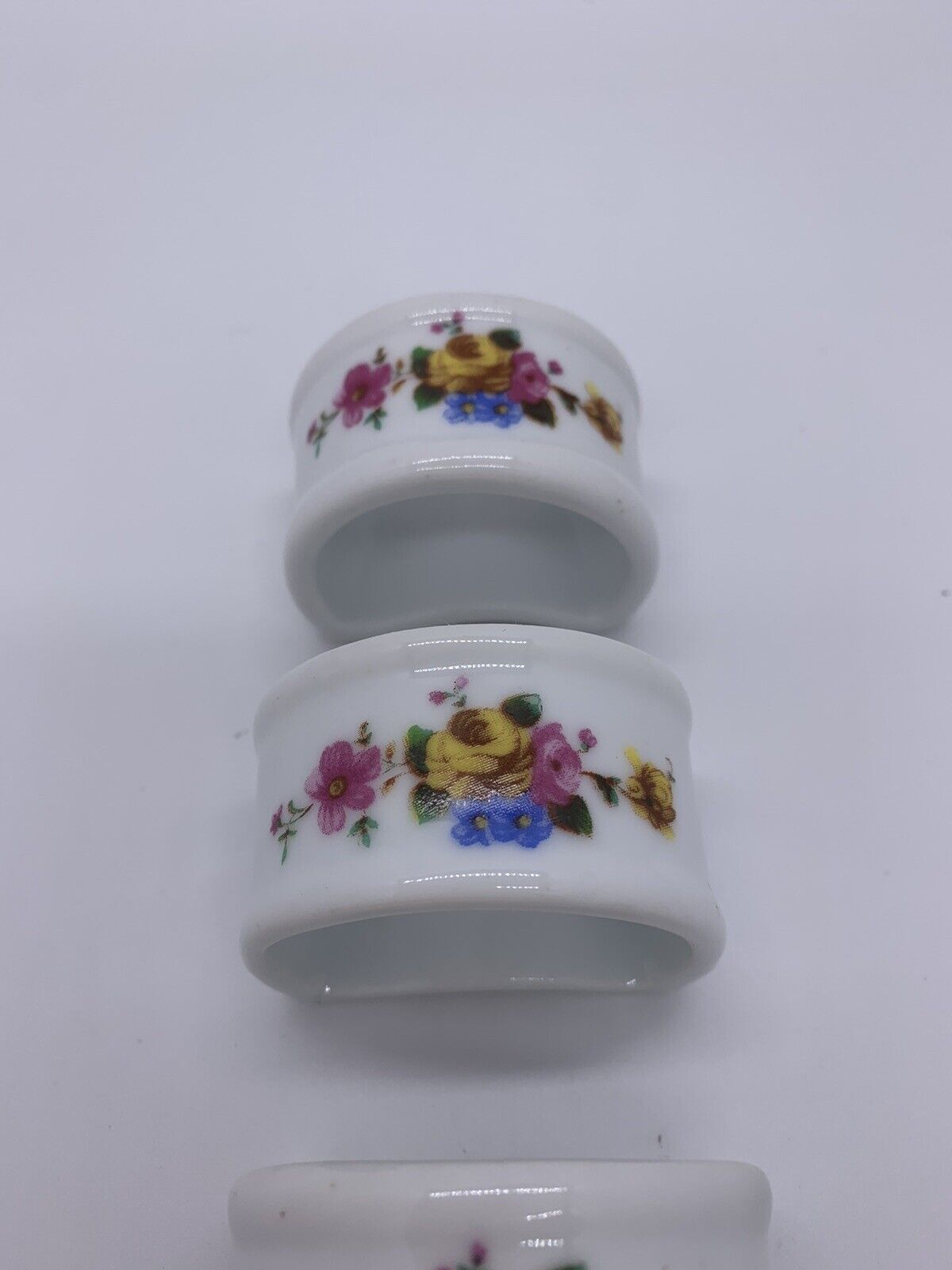 Vintage Genuine Porcelain Napkin Rings With White and Blue Flowers Set of 4